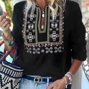 New 3/4 sleeve embroidered top